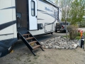 Carmacks Hotel & RV Park - Awkwardly placed landscaping  caused problems on setup and difficulties moving around the campsite.
