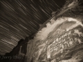 Star trails over the Great Hunt rock art panel - Nine Mile Canyon - black and white